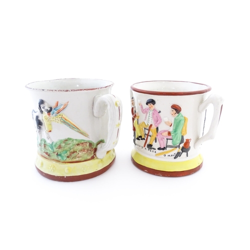 59A - Two Staffordshire pottery loving cups / frog mugs, one with relief decoration depicting a hunting do... 