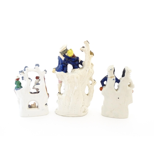 61 - Three Victorian Staffordshire pottery flatback figural groups, to include a couple with a lamb, two ... 