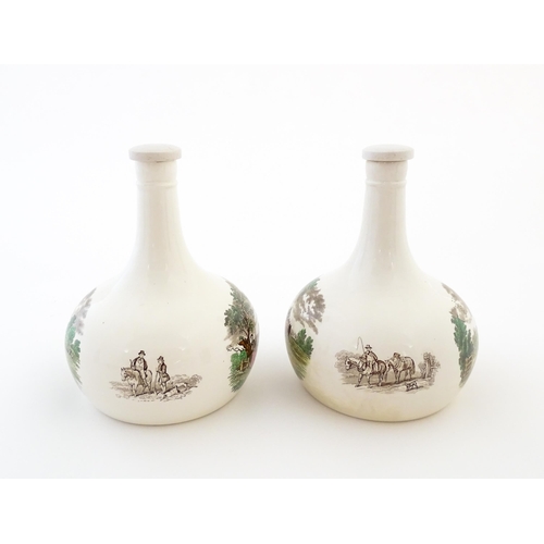 66 - A pair of Copeland Spode lidded bottle vases / flagons decorated with country scenes. Marked under. ... 