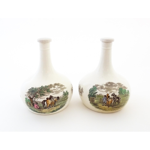 66 - A pair of Copeland Spode lidded bottle vases / flagons decorated with country scenes. Marked under. ... 