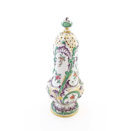 68 - A Samson sugar sifter / shaker decorated with floral and foliate decoration. Signed under with Orien... 