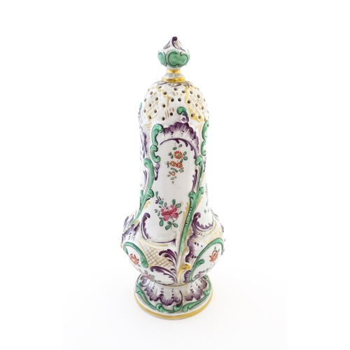 68 - A Samson sugar sifter / shaker decorated with floral and foliate decoration. Signed under with Orien... 