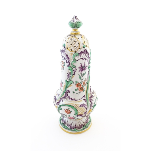 68 - A Samson sugar sifter / shaker decorated with floral and foliate decoration. Signed under with Orien... 