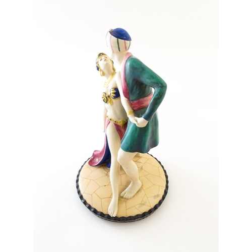 75 - A Royal Dux Art Deco figural group of two dancers, possibly modelled as Rudolph Valentio and Vilma B... 