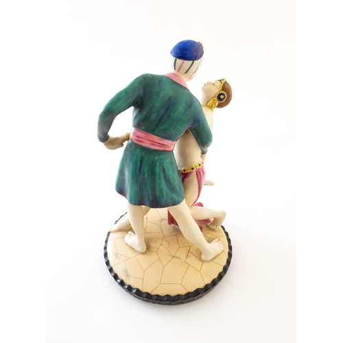 75 - A Royal Dux Art Deco figural group of two dancers, possibly modelled as Rudolph Valentio and Vilma B... 