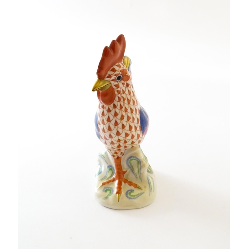 79 - A Herend porcelain model of a cockerel / rooster with fishnet decoration and gilt highlights. Marked... 