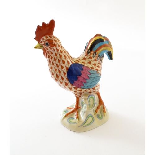 79 - A Herend porcelain model of a cockerel / rooster with fishnet decoration and gilt highlights. Marked... 