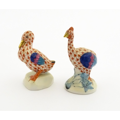 81 - Two Herend porcelain models of birds comprising guinea fowl, and duck, both with fishnet decoration ... 