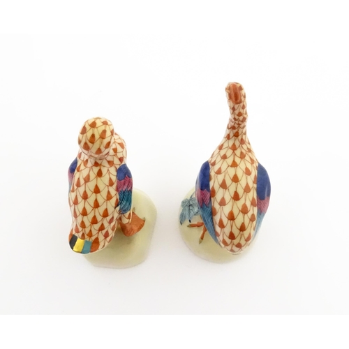 81 - Two Herend porcelain models of birds comprising guinea fowl, and duck, both with fishnet decoration ... 