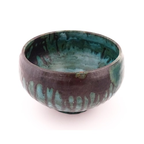 94 - A studio pottery bowl with drip glaze. Signed under R. Berrisford, 1959. Approx. 4 1/2