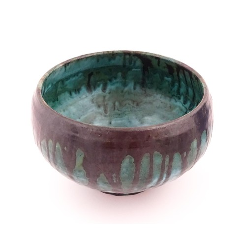 94 - A studio pottery bowl with drip glaze. Signed under R. Berrisford, 1959. Approx. 4 1/2