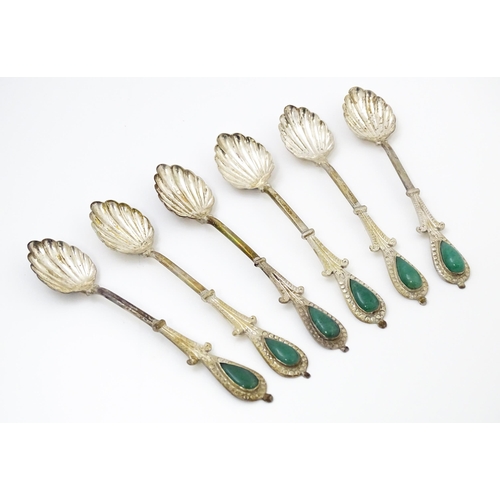 661 - A set of six silver plate teaspoons with green jade coloured cabochon detail to handles. Cased. Appr... 