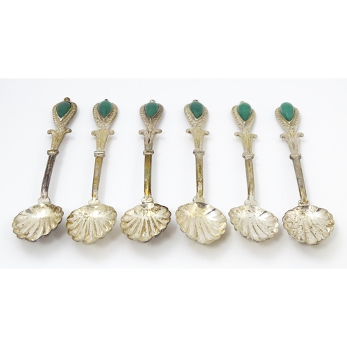 661 - A set of six silver plate teaspoons with green jade coloured cabochon detail to handles. Cased. Appr... 