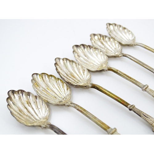 661 - A set of six silver plate teaspoons with green jade coloured cabochon detail to handles. Cased. Appr... 