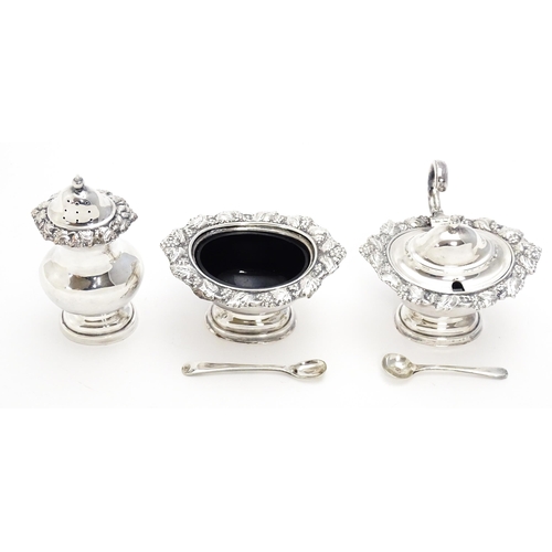 671 - A quantity of silver plate items to include coaster with turned wooden base, cruet set, etc.