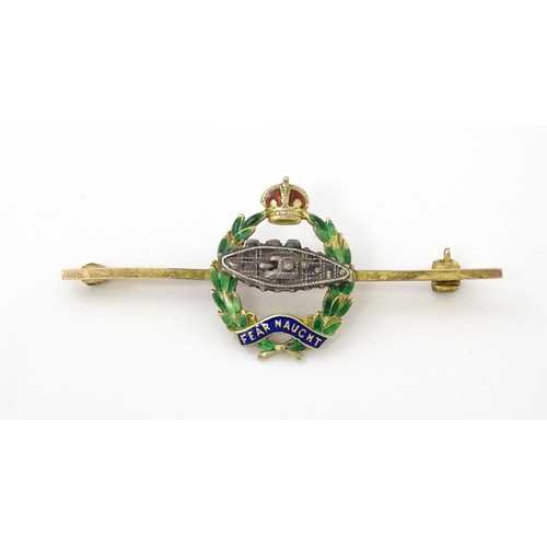 833 - Military Interest : A 9ct gold regimental bar brooch for the Royal Tank Corps depicting insignia wit... 