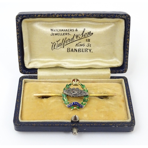 833 - Military Interest : A 9ct gold regimental bar brooch for the Royal Tank Corps depicting insignia wit... 