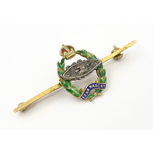 833 - Military Interest : A 9ct gold regimental bar brooch for the Royal Tank Corps depicting insignia wit... 