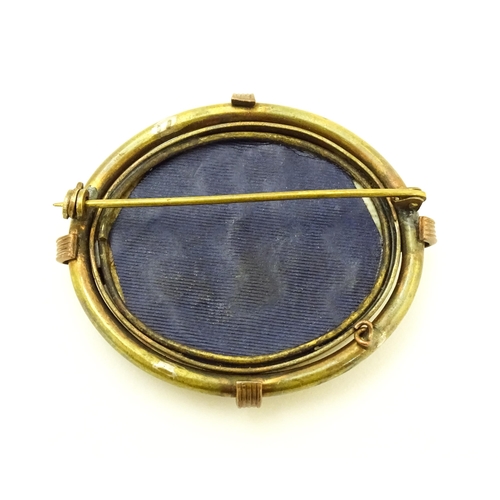 847 - A Victorian brooch of oval form with hand painted scene to centre depicting the Great Pagoda of the ... 