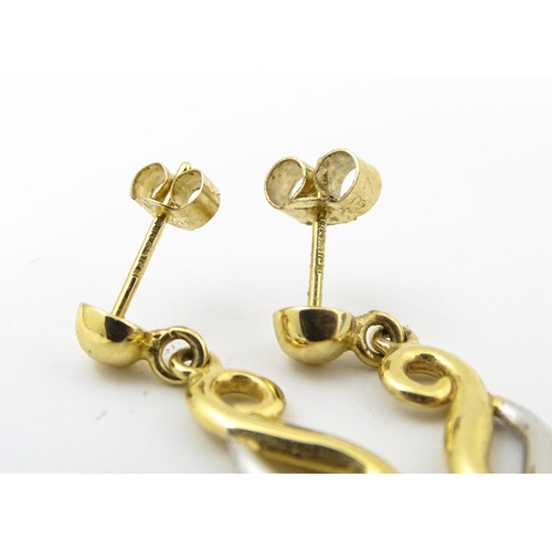 864 - Assorted earrings to include 9ct gold, yellow metal and gilt metal examples