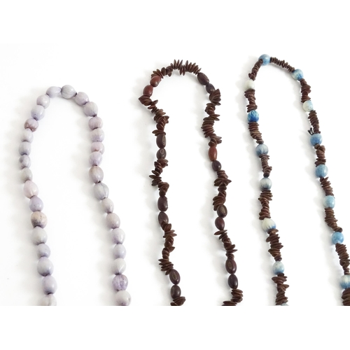 892 - A quantity of assorted seed bead necklaces to include examples from St Helena