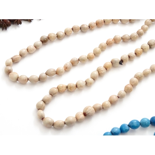 892 - A quantity of assorted seed bead necklaces to include examples from St Helena