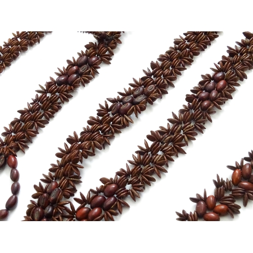 892 - A quantity of assorted seed bead necklaces to include examples from St Helena