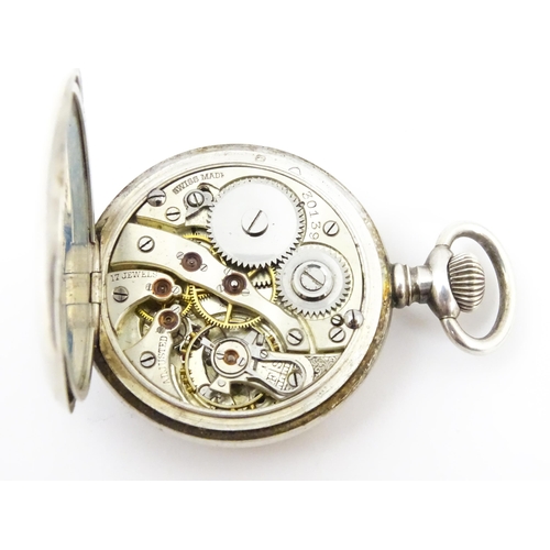 930 - An early 20thC silver ladies pendant/fob watch, The Swiss 17-jewel movement with white enamel dial h... 