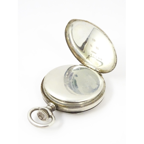 930 - An early 20thC silver ladies pendant/fob watch, The Swiss 17-jewel movement with white enamel dial h... 