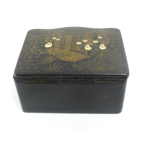 1082 - Four assorted items to include a papier mache lacquered match box with chinoiserie decoration, a bra... 