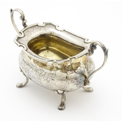 277 - A silver sugar bowl with twin handles, hallmarked Birmingham, 1912 maker E S Barnsley & Co (Edward S... 