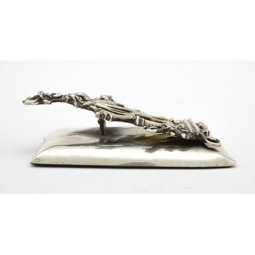 289 - A silver desk / paper clip depicting the personification of Plenty, hallmarked Chester 1901, maker G... 