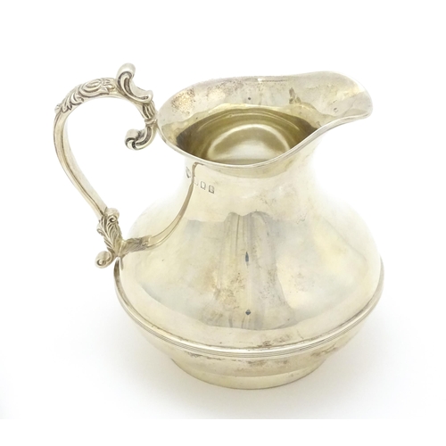 294 - A silver jug hallmarked London 1934, maker Goldsmiths & Silversmiths Co. Ltd. Approx. 4 1/2