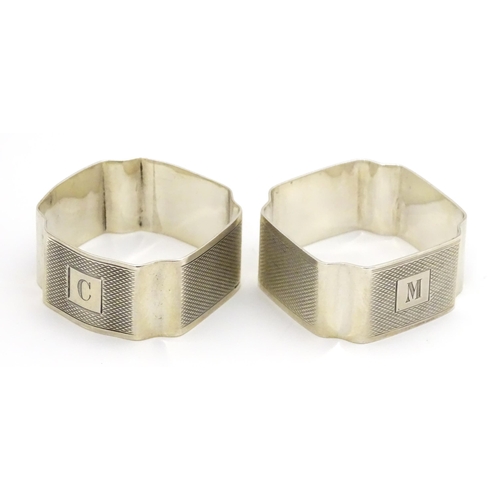 295 - A pair of Art Deco silver napkin ring hallmarked Birmingham 1937, maker I. S. Greenberg & Co. (2)