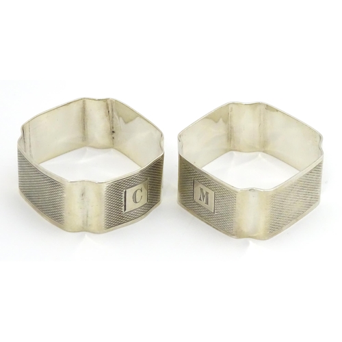 295 - A pair of Art Deco silver napkin ring hallmarked Birmingham 1937, maker I. S. Greenberg & Co. (2)