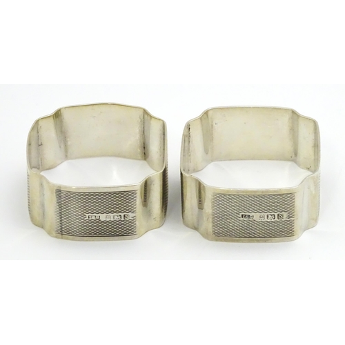 295 - A pair of Art Deco silver napkin ring hallmarked Birmingham 1937, maker I. S. Greenberg & Co. (2)