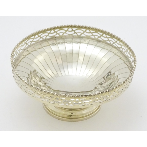 296 - An Art Deco style silver pedestal bon bon dish with pierced decoration hallmarked Birmingham 1949, m... 