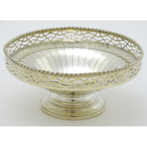 296 - An Art Deco style silver pedestal bon bon dish with pierced decoration hallmarked Birmingham 1949, m... 