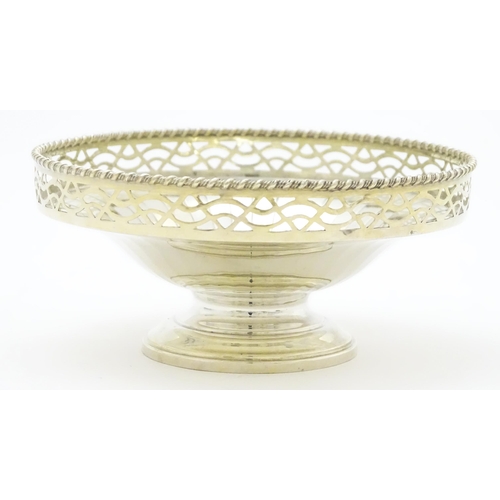 296 - An Art Deco style silver pedestal bon bon dish with pierced decoration hallmarked Birmingham 1949, m... 