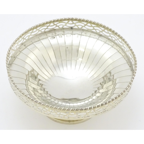 296 - An Art Deco style silver pedestal bon bon dish with pierced decoration hallmarked Birmingham 1949, m... 