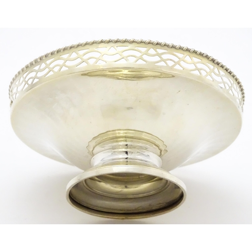 296 - An Art Deco style silver pedestal bon bon dish with pierced decoration hallmarked Birmingham 1949, m... 