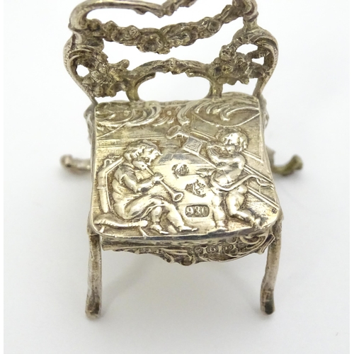 308 - A 19thC Continental .930 silver model of a chair with import marks for London 1897 imported David Br... 