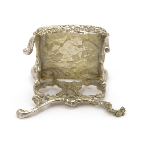 308 - A 19thC Continental .930 silver model of a chair with import marks for London 1897 imported David Br... 