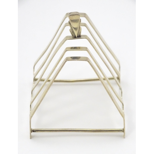 310 - An Art Deco silver five bar toast rack of triangular form hallmarked Birmingham 1938, maker Charles ... 