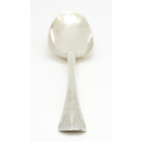 311 - An 18thC silver Hanoverian pattern table spoon hallmarked London 1739, maker Samuel Hutton. Approx. ... 