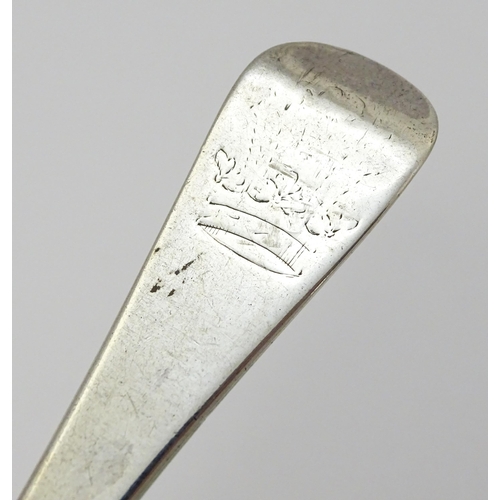 311 - An 18thC silver Hanoverian pattern table spoon hallmarked London 1739, maker Samuel Hutton. Approx. ... 