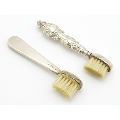 320 - Two silver moustache brushes, one hallmarked Birmingham 1925, maker Henry Clifford Davis, the other ... 