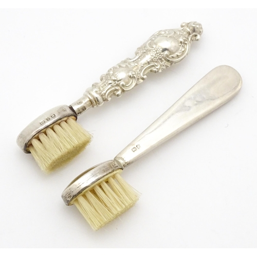 320 - Two silver moustache brushes, one hallmarked Birmingham 1925, maker Henry Clifford Davis, the other ... 