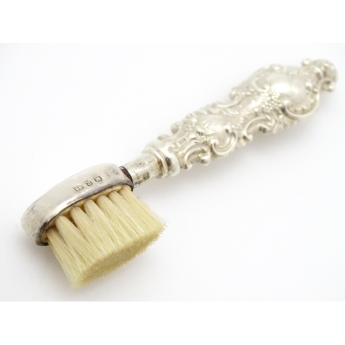 320 - Two silver moustache brushes, one hallmarked Birmingham 1925, maker Henry Clifford Davis, the other ... 