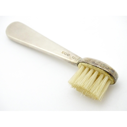 320 - Two silver moustache brushes, one hallmarked Birmingham 1925, maker Henry Clifford Davis, the other ... 